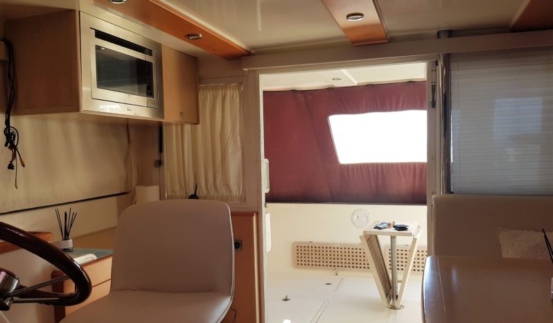 CATAMARAN A MOTOR – EXCITECAT 10.10 lleno